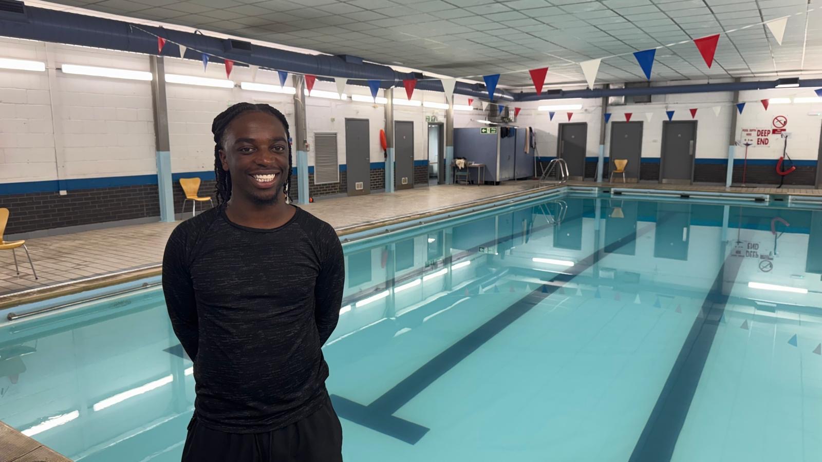 Adriel Ogunjebe, Aqua Jetz swimming instructor, poolside at Harris Academy